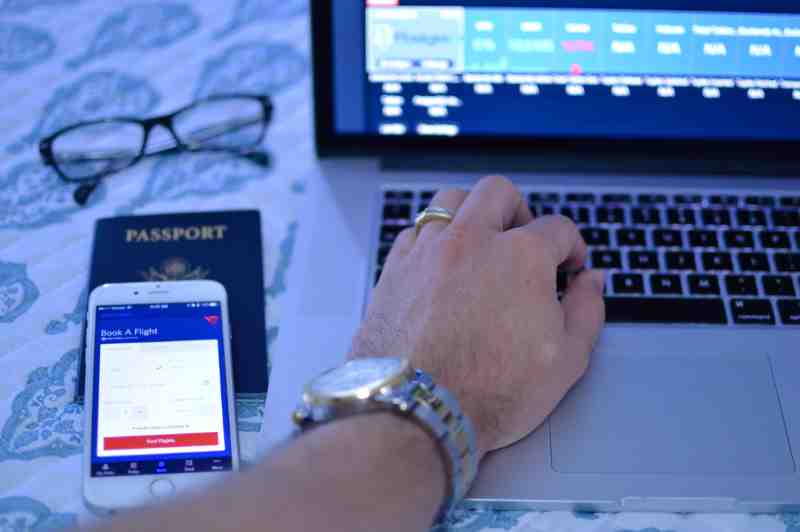 computer researching flight bookings