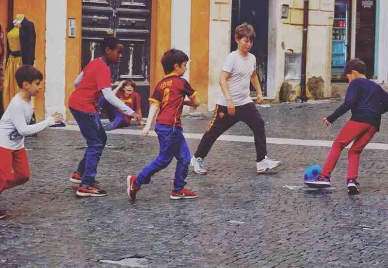 kids playing football