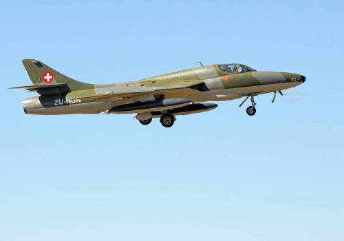 BLOEMFONTEIN, SOUTH AFRICA - MAY 4TH, 2013: A Hawker Hunter T.68 fly-by at an airshow at the Tempe Airport near Bloemfontein, South Africa. It is a subsonic British jet aircraft developed in the 1950s